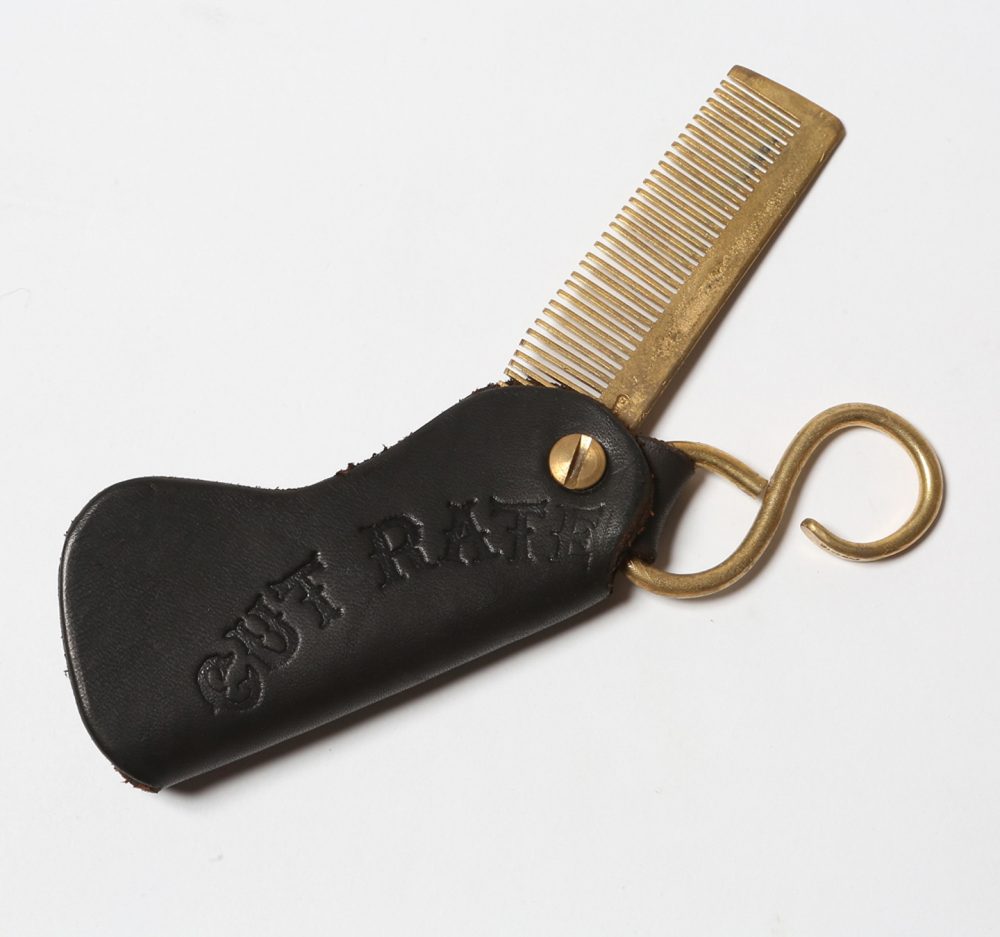 LEATHER COMB